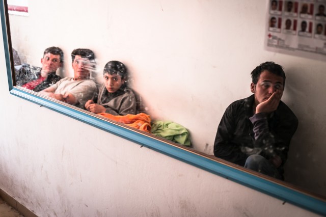 Migrants on the Hotel Captain Elias in Kos, where hundreds of people have gathered and are living in hard conditions while waiting for a permanent permit